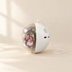 MerryOrb in white, showing a family photo