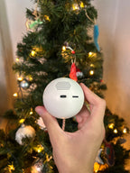 Memory Orb in white, back with speaker, USB-C port and switch