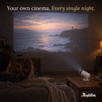 Couple watching a movie projected on the living room wall – your own cinema, every single night