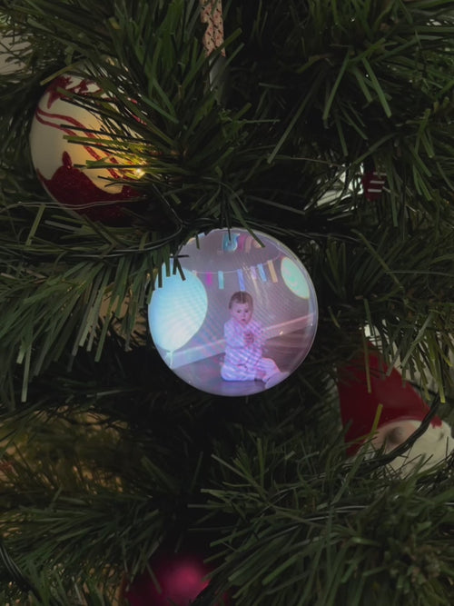 Memory Orb hanging on the tree, playing a family video